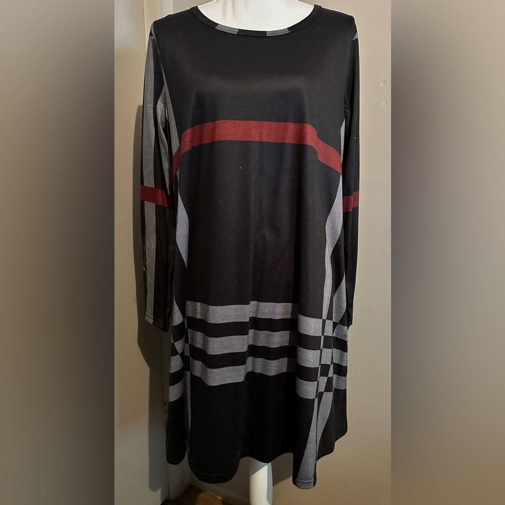 Black long sleeve dress, with lined accents, cool fabric for all day wear. 2XL
